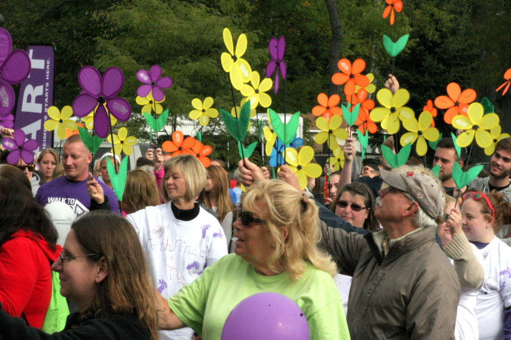 The 9th annual Alzheimer's Walk was held at the Plains at Parrish Homestead on Saturday morning where 150 walkers participated. Before heading out the walkers assembled and raised their flower-shaped pinwheels in the air, each color representing their levels of support and involvement in the fight against the disease.