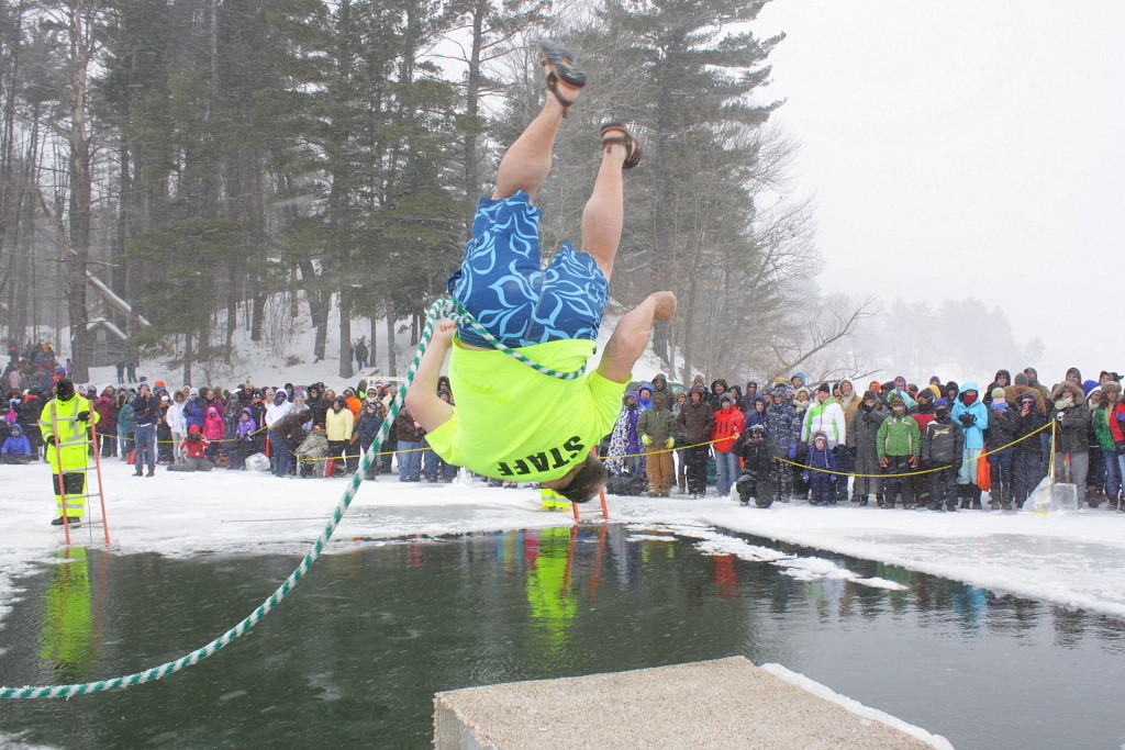 Victor Erway, Fly Creek, flips backwards into the water.