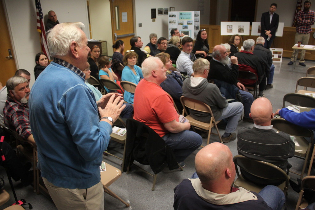 Former Mayor David Brenner speaks out against the proposed Hemlock Village adult living community at a public information session at Town Hall on Wed. night. (Ian Austin/allotsego.com)