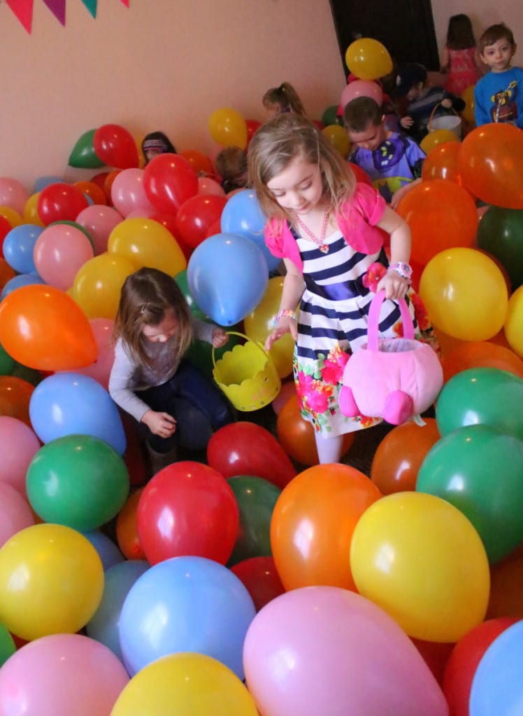 Lily Benoit, Davenport, and Jordan O'Dell, Oneonta, search for Easter eggs in the balloon room during the 4th annual Easter egg hunt at the Bookout Funeral home. Children and their families could enjoy snacks, and photos with the Easter bunny. The event goes until 1pm. (Ian Austin/ AllOTSEGO.com)