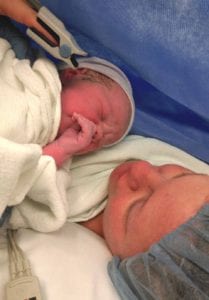Newborn Abigail McKynze Pierce cuddles with her mom Alisia.